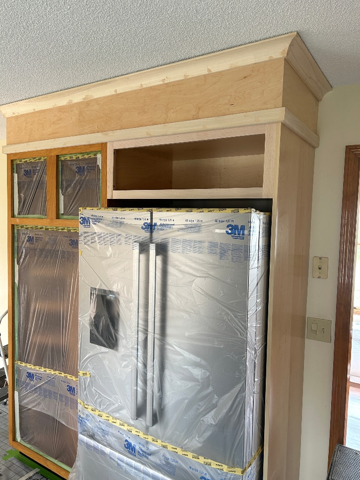 Additional storage cabinets added alongside cabinet refacing project in Chicopee MA