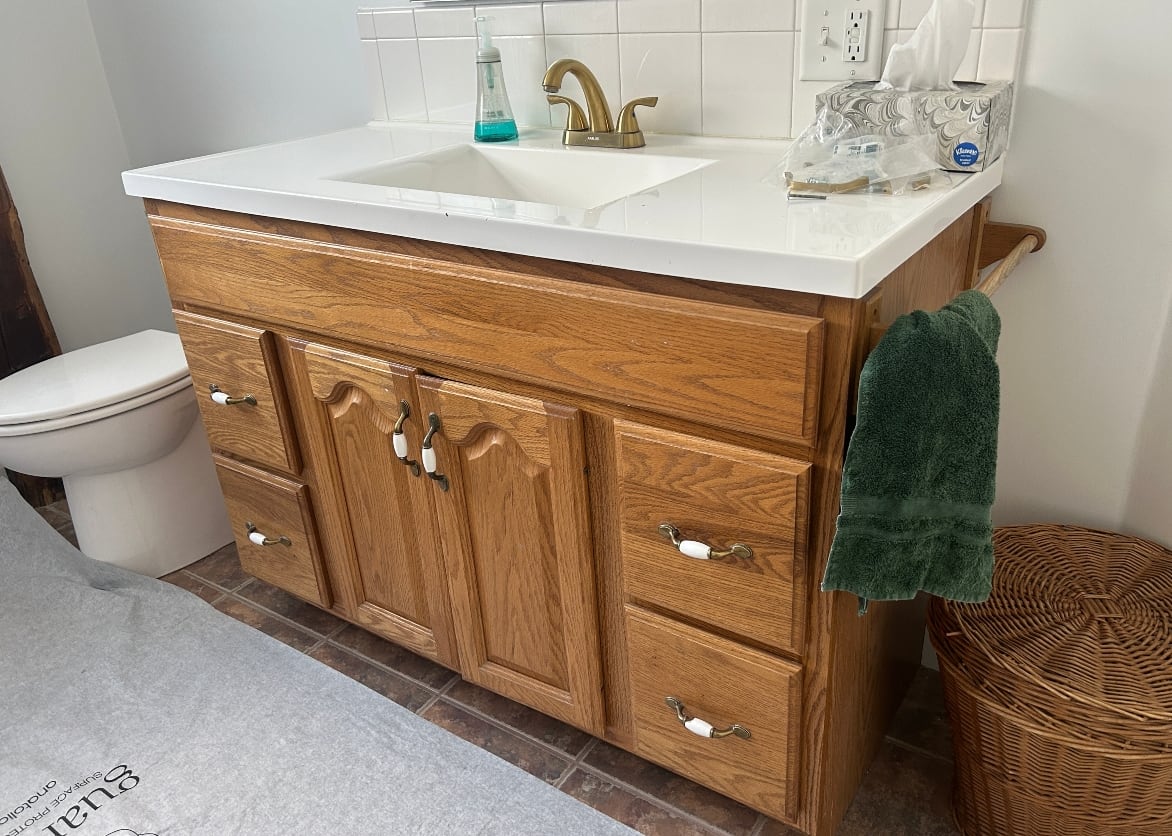 Bathroom vanity before refacing in Amherst, MA