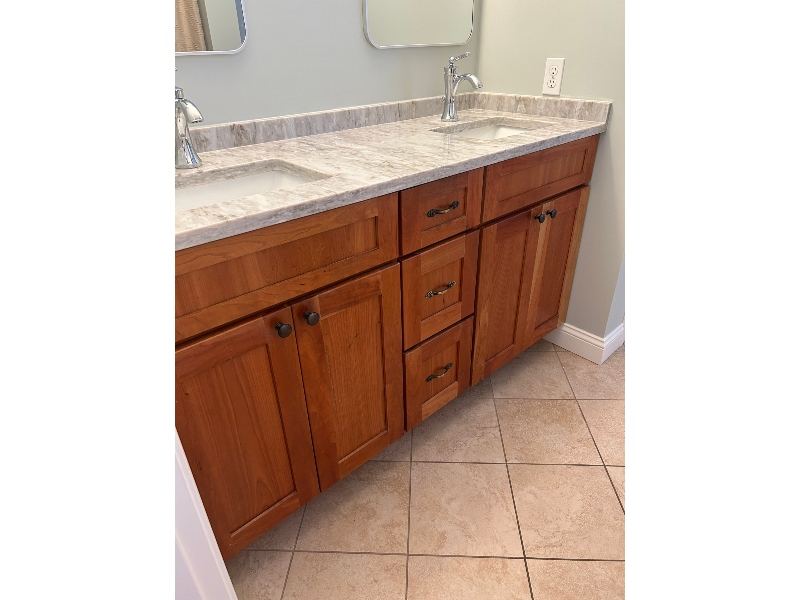 Bathroom vanity cabinet before professional refacing
