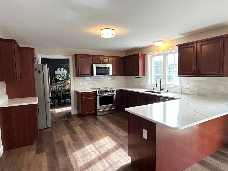 Older cherry kitchen cabinets before refacing in Ludlow, MA