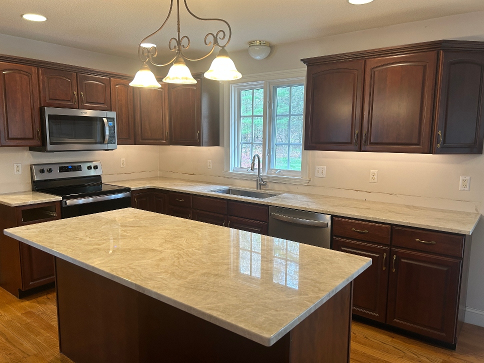 Worn outdated kitchen cabinets before refacing in Westfield MA