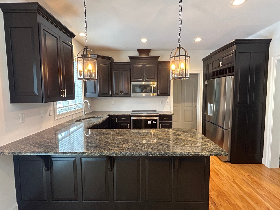 Kitchen cabinets refinished in rich dark espresso stain