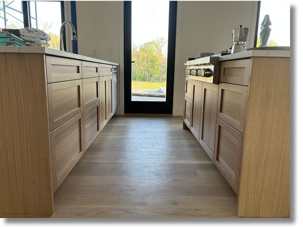 Domestic natural hardwood cabinet material — wood grain detail showing natural hardwood quality used in custom cabinet doors and drawer fronts