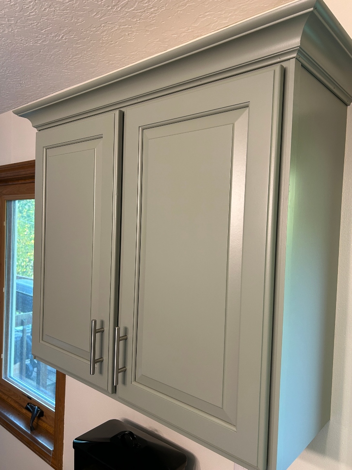 Evergreen Fog cabinet paint color over dark oak cabinets