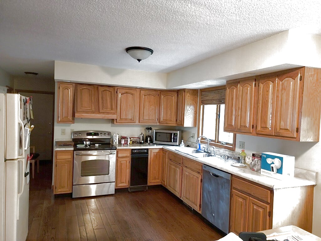 Honey oak kitchen cabinets before refacing in Chicopee, MA
