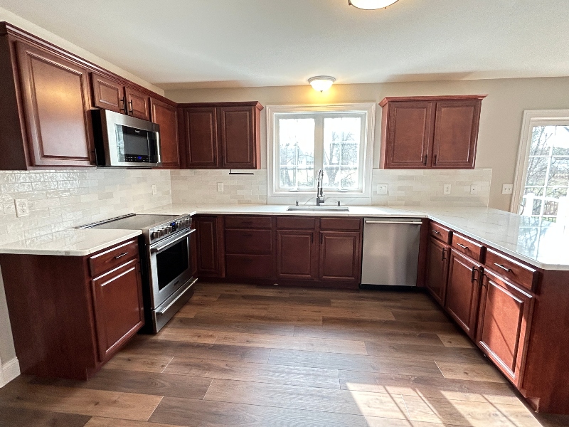 Dark wood kitchen remodel with optimized layout
