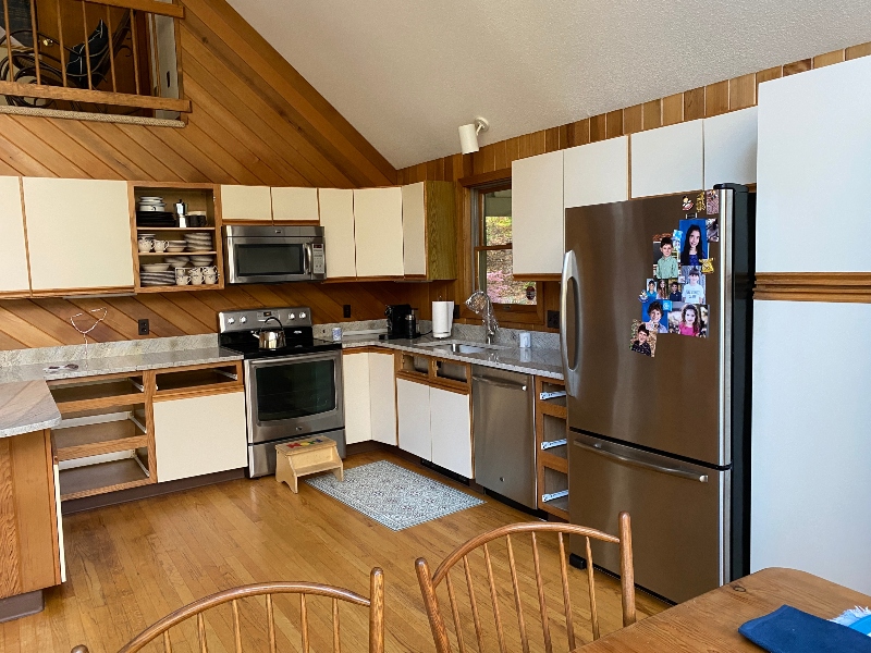Warm wood kitchen remodel with updated cabinets and countertops