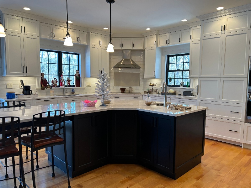 White kitchen with black island in Western Massachusetts remodel