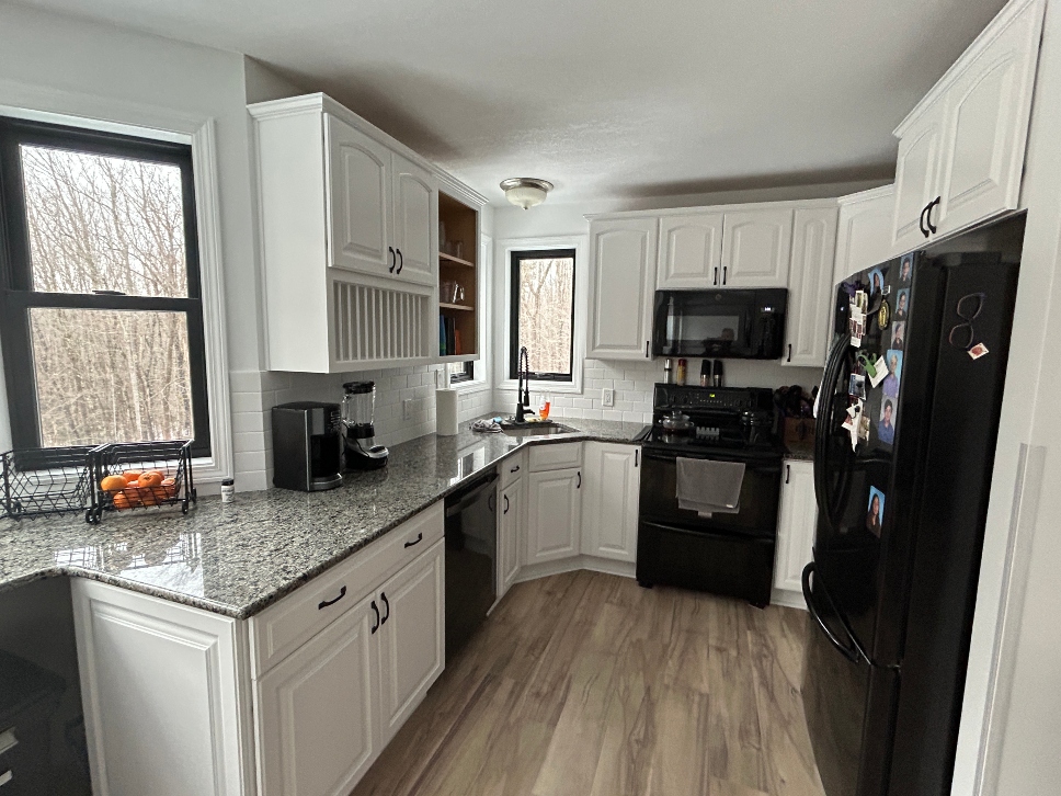 Maple kitchen cabinets after professional painting second view