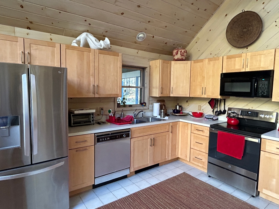Natural cherry wood kitchen cabinet refacing