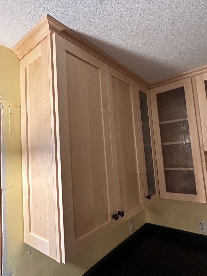 Natural maple wood kitchen after professional finish work