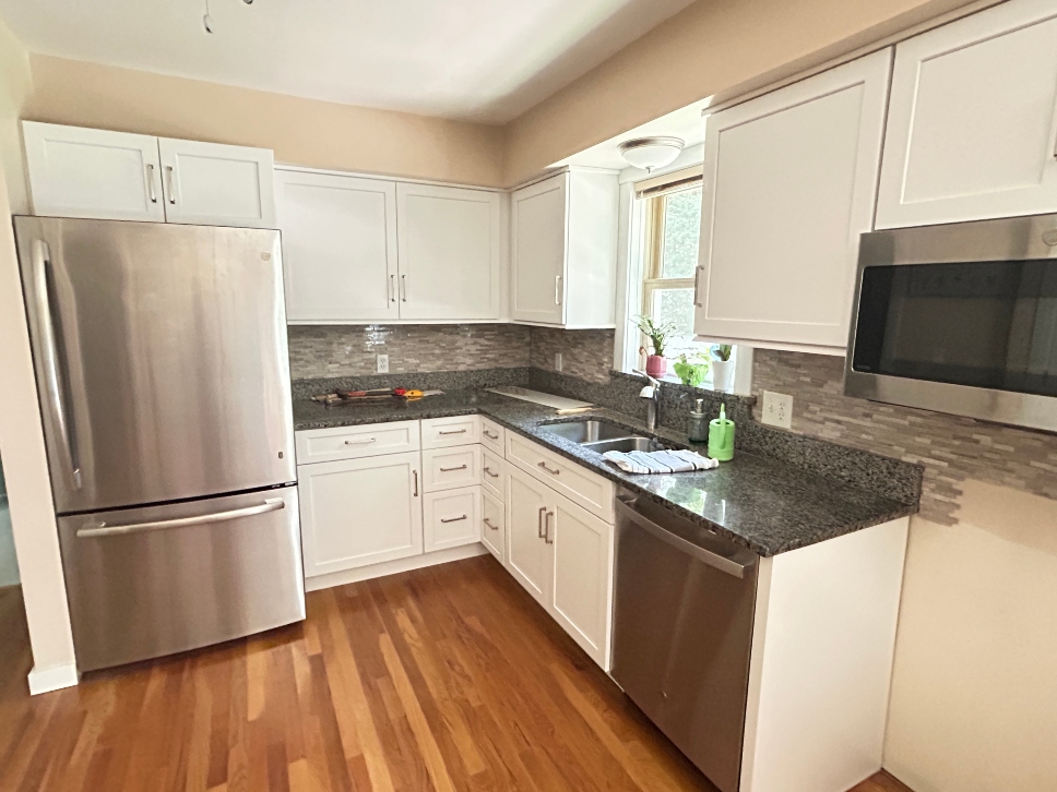 Honey oak cabinets refaced to white shaker style in Stafford, CT