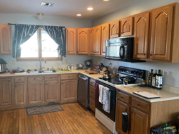 Before cabinet painting in Ware MA — kitchen cabinets before professional spray painting