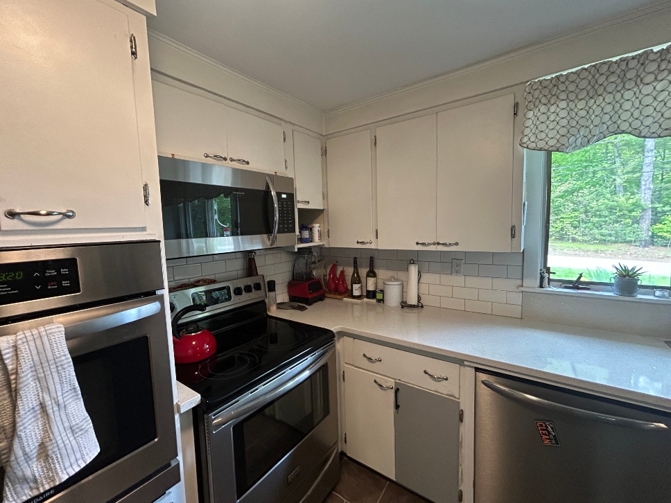 Kitchen cabinets before refacing in West Brookfield, MA